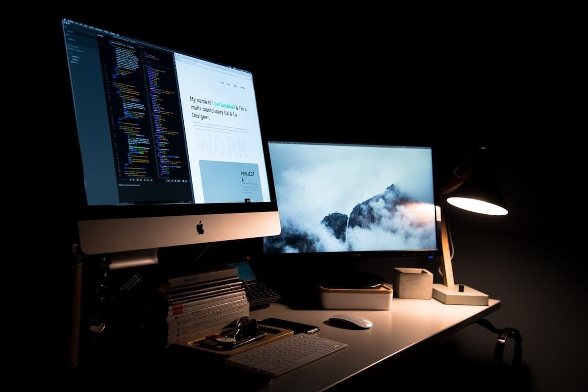 Website development case study for an HVAC service company, shown on dual monitors